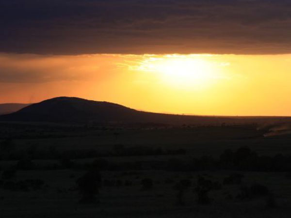 (Photo:) zachód słońca w Masai Mara
